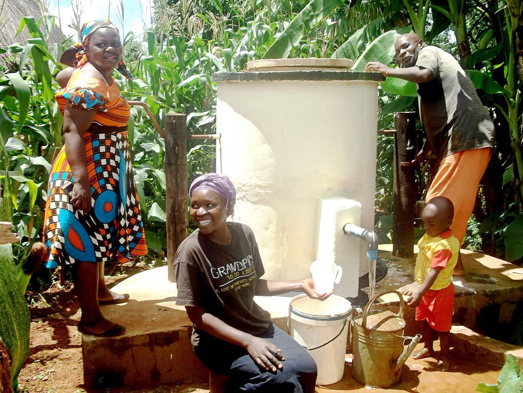 Villagers using one of AquAids Elephant Pumps